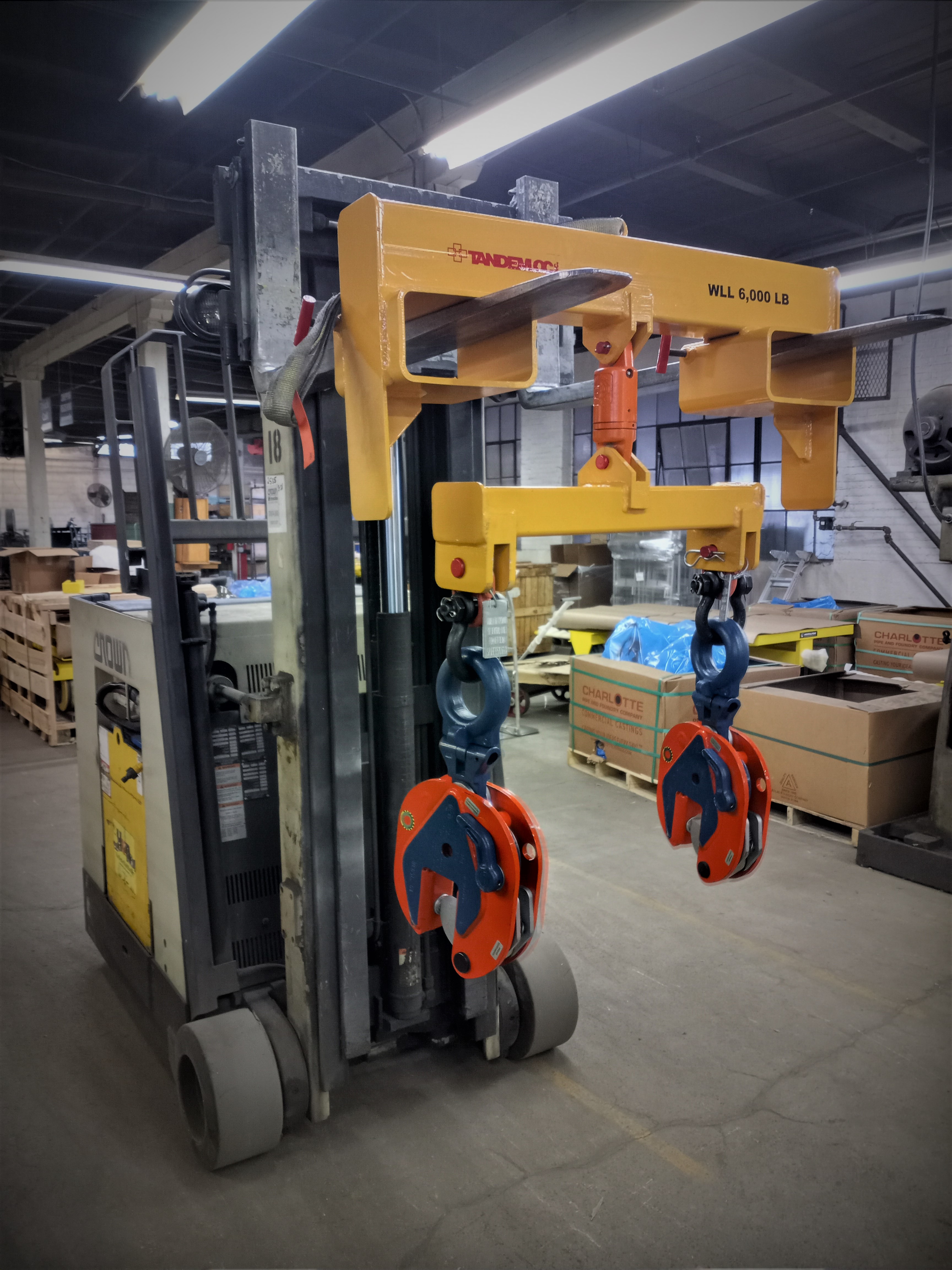 Fork lift attachment. Lifting beam - load swivel - spreader beam and plate clamps